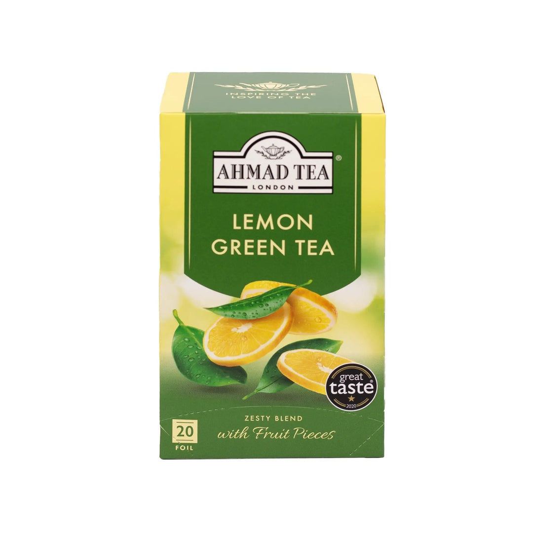 Delikatesi i tako to... Ahmad Tea Lemon Green tea box with 20 foil-wrapped bags and citrus fruit imagery.
