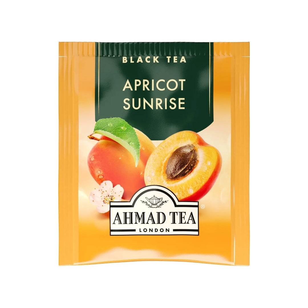 Delikatesi i tako to... Ahmad Tea Apricot Sunrise black tea bag with vibrant apricot fruit illustration