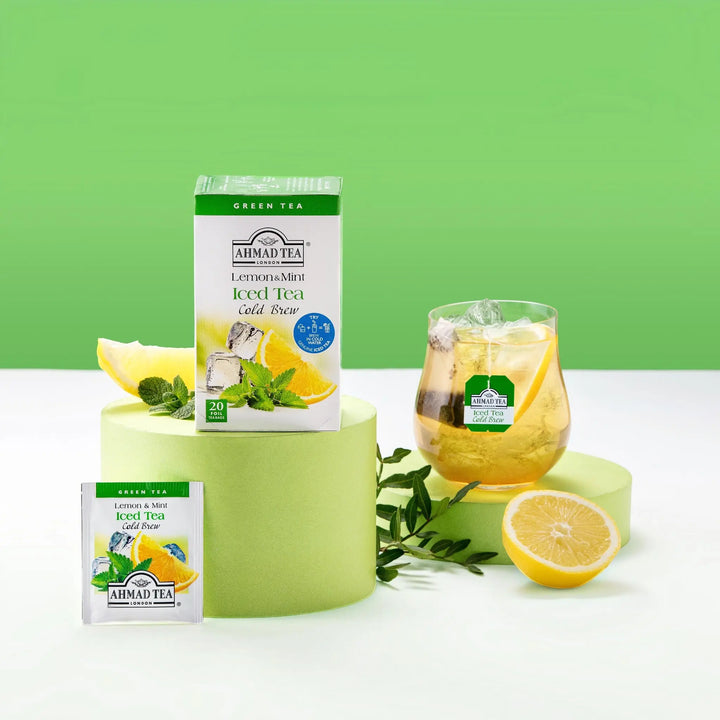 Delikatesi i tako to... Ahmad Tea Lemon & Mint Cold Brew green tea box, individual sachet, and iced tea glass