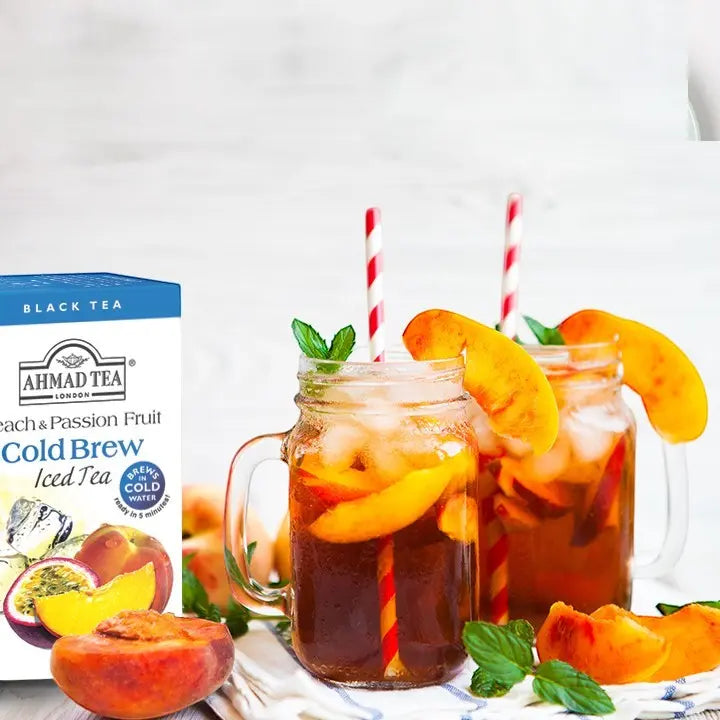 Delikatesi i tako to... Ahmad Tea Peach and Passion Fruit cold brew iced tea in mason jars with fresh fruit garnish