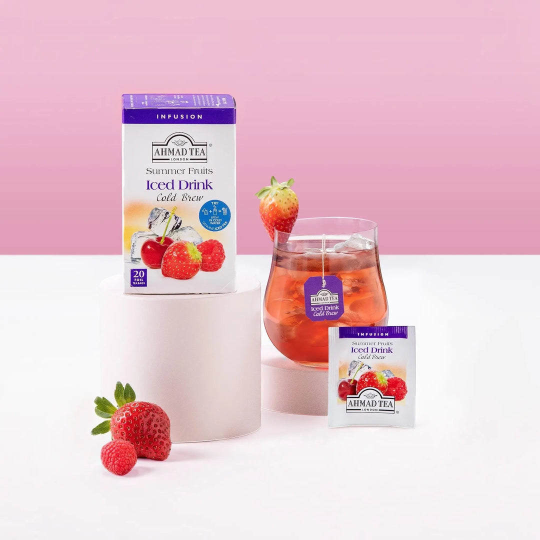 Delikatesi i tako to... Ahmad Tea Summer Fruits cold brew iced tea box, individual sachet, and glass with fresh berries