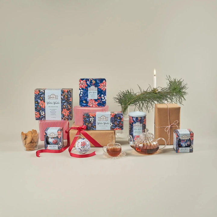 Delikatesi i tako to... Ahmad Tea Winter Wonder collection featuring Earl Grey tea tins, ornaments, and tea set.