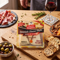 Delikatesi i tako to... Garcia Baquero Spanish cheese plate with Manchego, Iberico, and goat cheese slices on a board