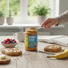 Delikatesi i tako to... KIKIRIKI PUTER peanut butter spread in a 290g jar on a breakfast table with toast and fruit.