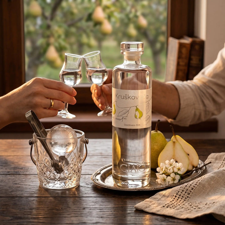 Delikatesi i tako to... Cilić pear brandy in a glass bottle with two people toasting with small glasses by a window