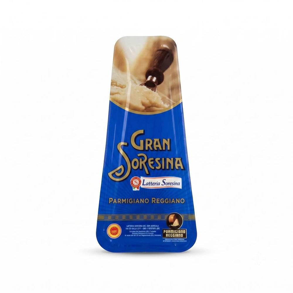 Delikatesi i tako to... Parmigiano Reggiano cheese wedge in blue vacuum-sealed packaging