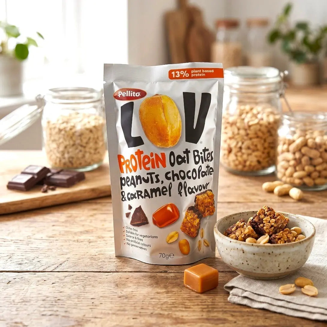 Delikatesi i tako to... Pellito protein oat bites with peanuts, chocolate, and caramel in a 70g pouch with a bowl.