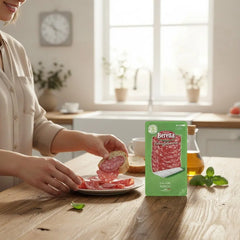 Delikatesi i tako to... Salama Napoli Beretta 80g sliced salami on a plate with bread in a bright kitchen setting